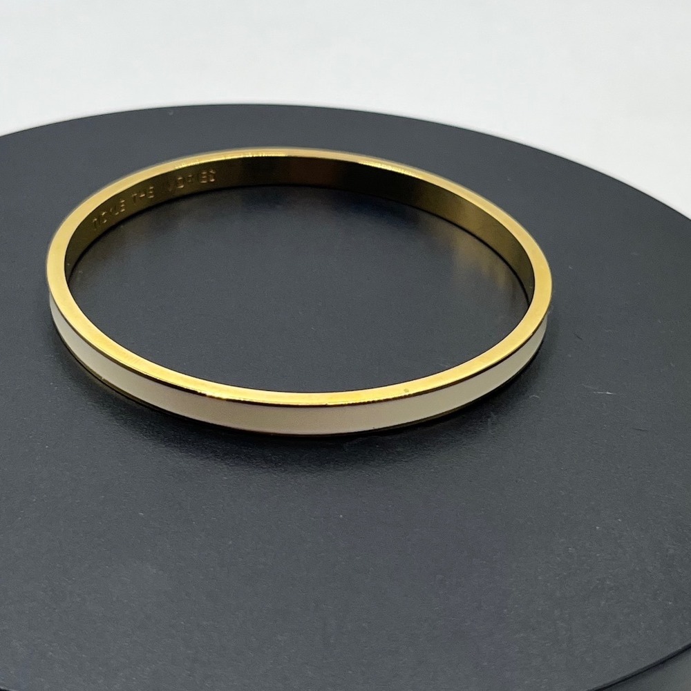 Kate Spade NY Tickle‎ the Ivories Ivory
Enamel 12k gold-plate Bangle Bracelet